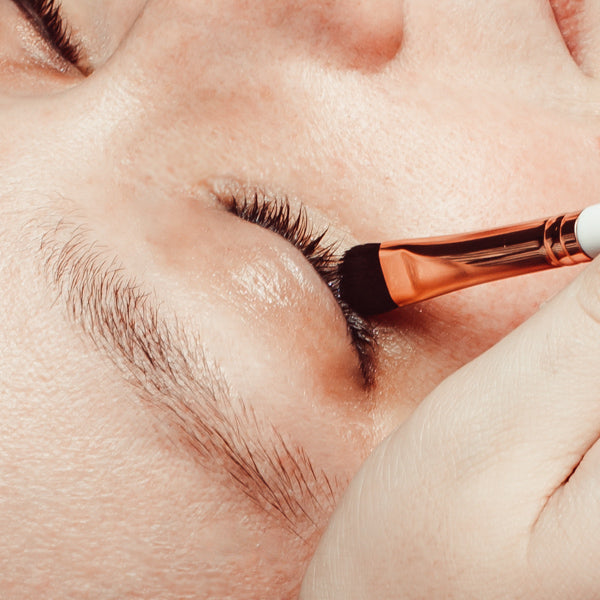 Eyelash Extension Aftercare Lash Brush for cleansers in use, closeup