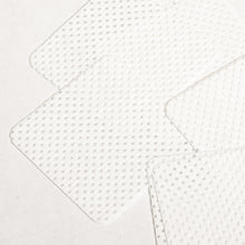 Load image into Gallery viewer, Closeup of Adhesive Wipes to show woven diamond texture

