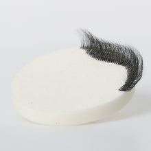 Load image into Gallery viewer, Crystallized Fan Eyelash Extensions practice set on a makup sponge
